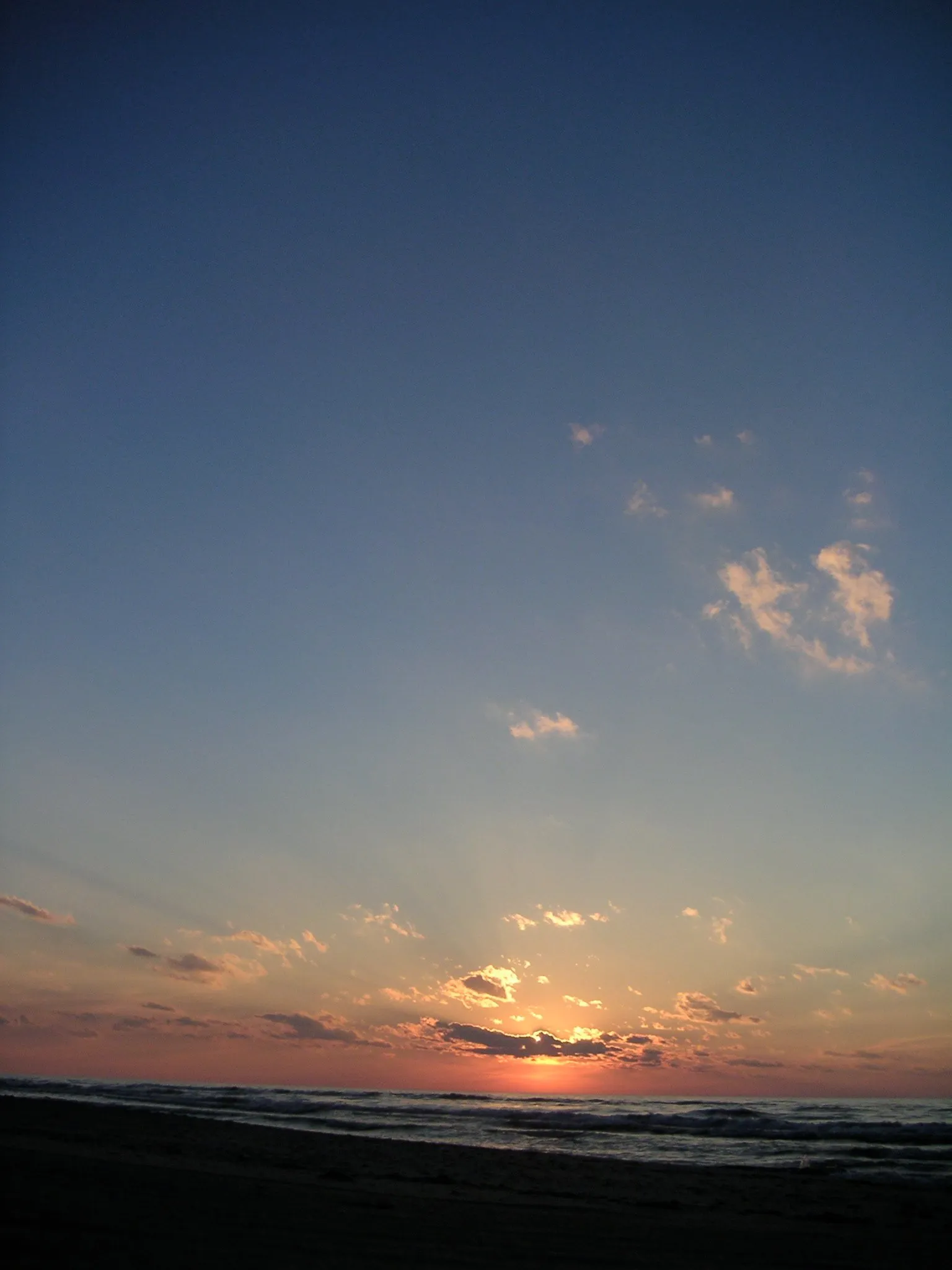 Sunset colors over the lake, tall view