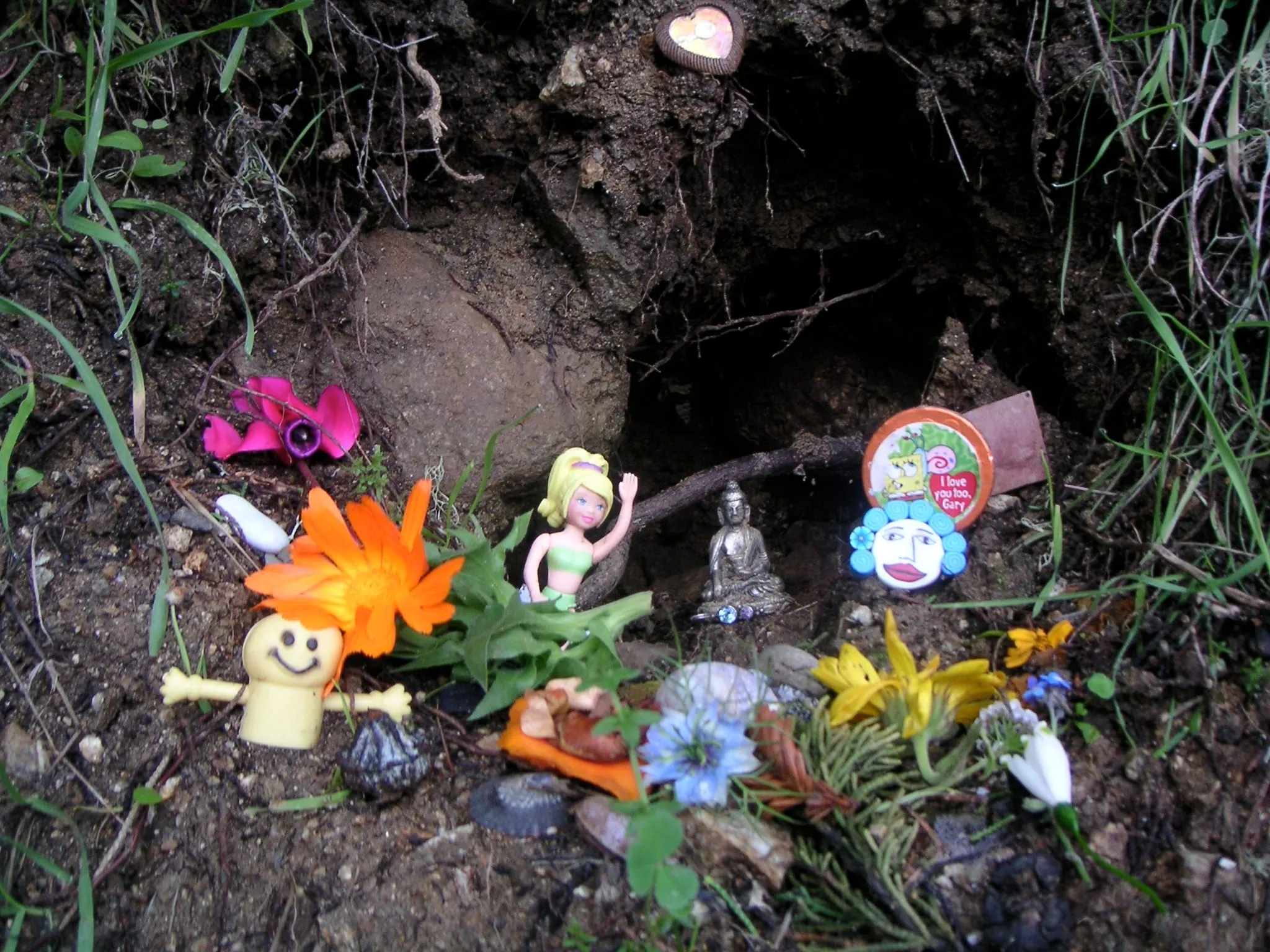 Finger puppets gathered among grasses and flowers at an IFS retreat